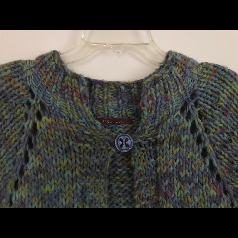 Hand knit sweater for layering look.